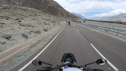 Candidate rider: white_bike/soft bags