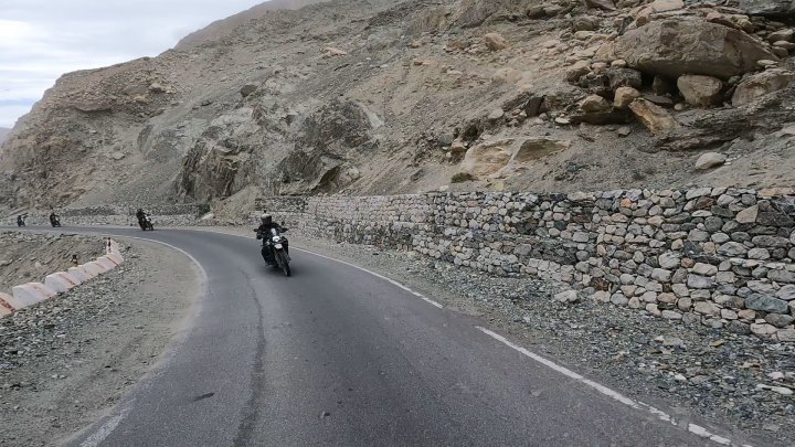 Rider in grey jacket on a motorcycle
