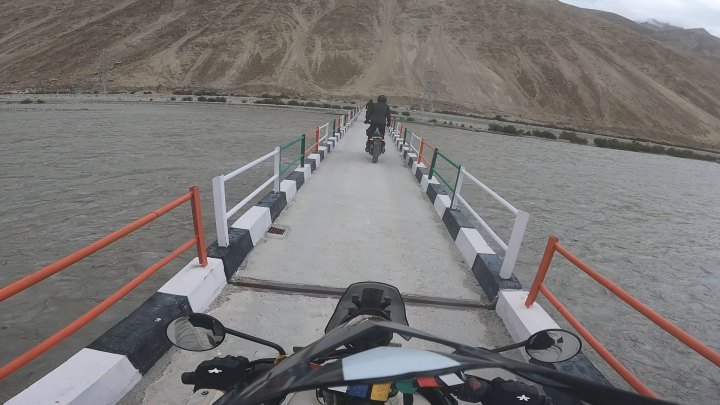 Rider in grey jacket on a motorcycle