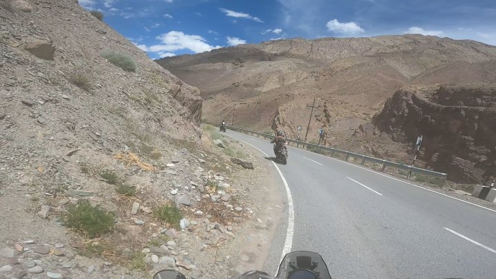 Rider in grey jacket on a motorcycle