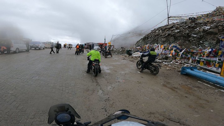 Rider in hi-vis jacket on a motorcycle