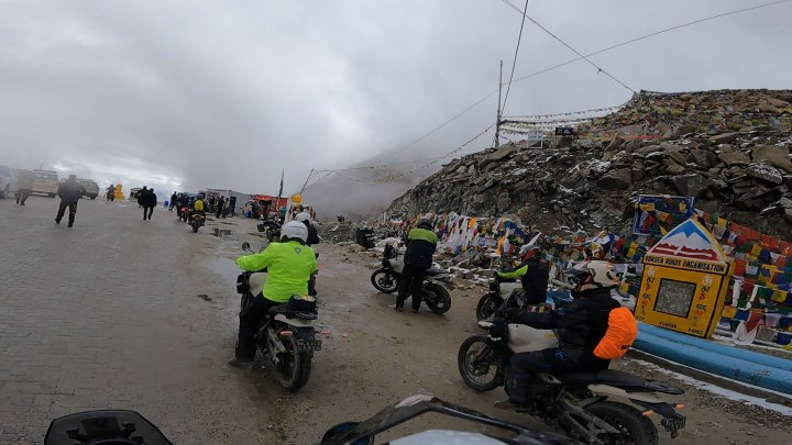 Rider in hi-vis jacket on a motorcycle