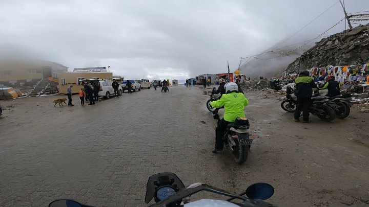 Rider in hi-vis jacket on a motorcycle