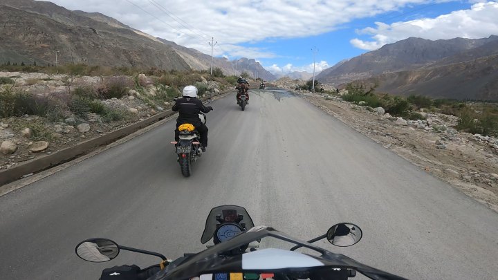 Rider in yellow jacket on a motorcycle