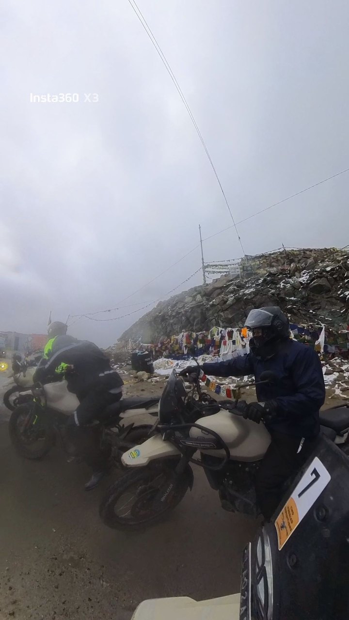 Rider in yellow jacket on a motorcycle